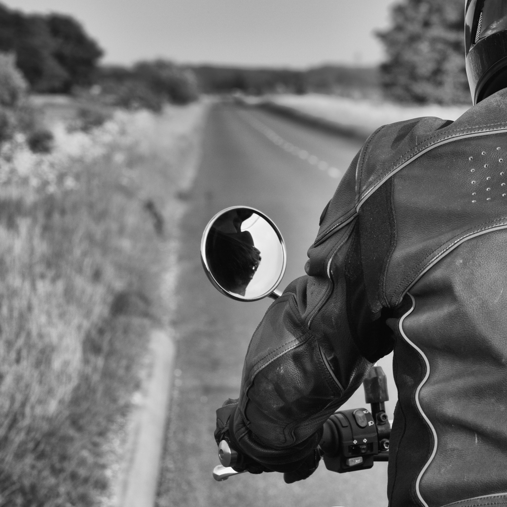 Biker riding through the countryside.