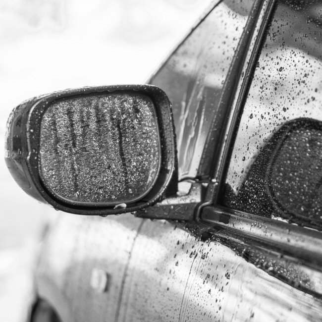 Car with wet windows.